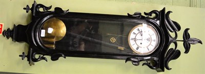 Lot 1310 - A Vienna type striking ebonised wall clock, double weight driven movement