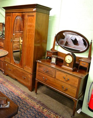 Lot 1311 - An Edwardian satinwood inlaid mahogany matched three piece bedroom suite, comprising dressing...