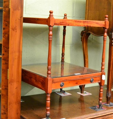 Lot 1320 - ~A modern mahogany coffee table with inset leather top, together with a yewwood two-tier stand (2)