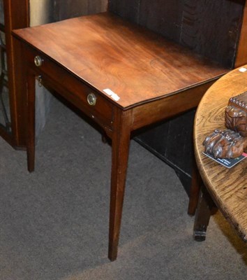 Lot 1324 - A 19th century mahogany side table, single drawer above brushing slide, on square tapered legs