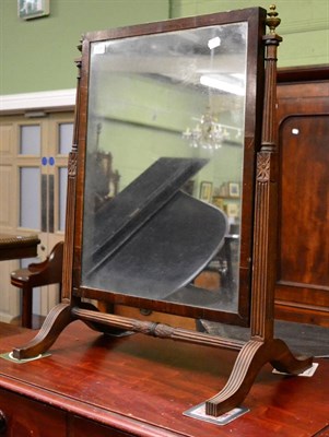 Lot 1331 - Regency mahogany mirror on a reeded trestle base