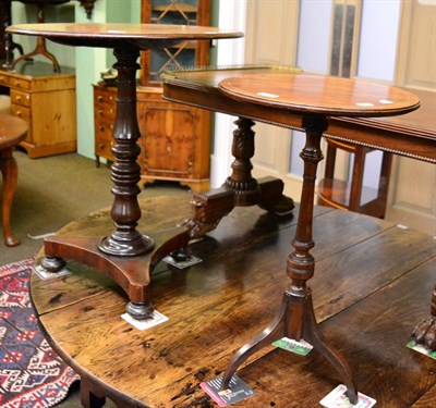 Lot 1333 - A 19th century mahogany tilt-top occasional table, turned column, trefoil base, together with a...