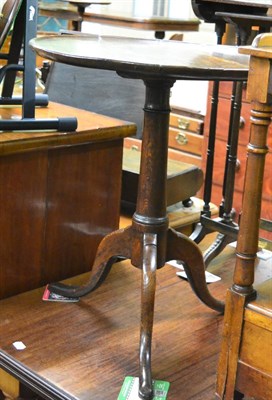 Lot 1343 - A George III oak tripod table