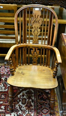 Lot 1358 - A yew wood Windsor chair