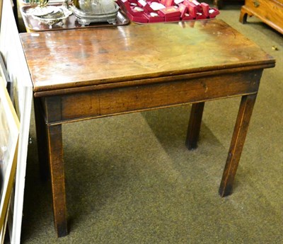 Lot 1364 - A George III mahogany fold over tea table