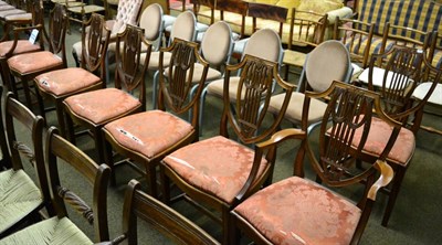 Lot 1369 - Set of eight shield back dining chairs including two carvers by S & H Jewell, Holborn, London, each