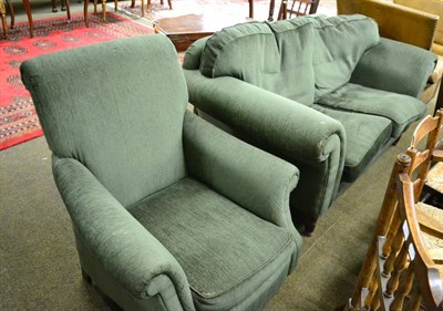 Lot 1379 - A modern green easy chair and sofa