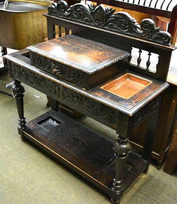 Lot 1405 - A Victorian carved oak hall stand