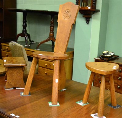 Lot 1407 - Two Acorn Industries oak stools and a Yorkshire School oak spinning chair carved with a rose