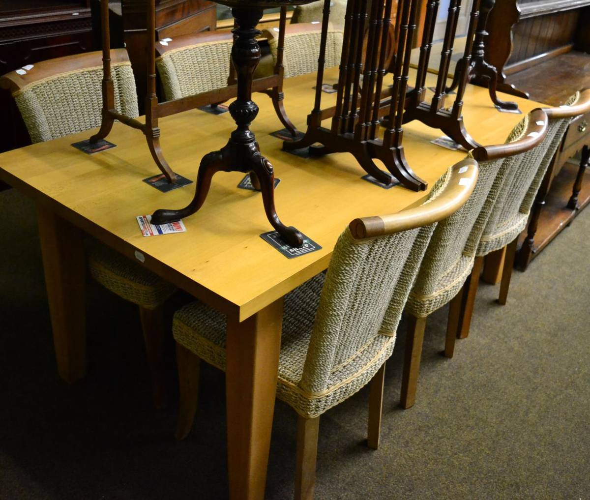 Lot 1410 - A dining table, sideboard and six chairs