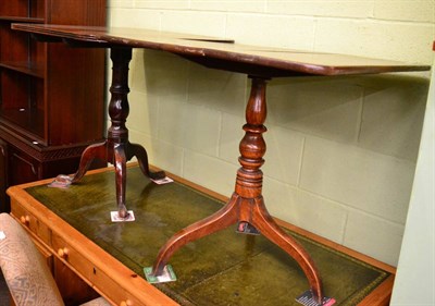 Lot 1413 - Two 19th century tripod tables, one oak, one mahogany