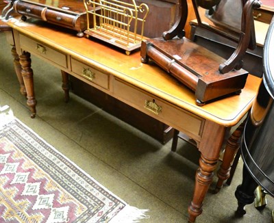 Lot 1426 - A 19th century side table fitted with three frieze drawers