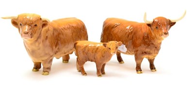 Lot 31 - Beswick Cattle comprising: Highland Bull, model No. 2008, Highland Cow, model No. 1740 and Highland