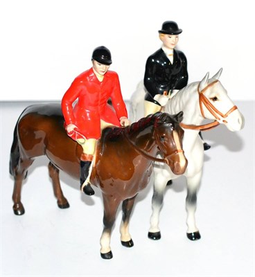 Lot 84 - Beswick Huntsman, (Style Two: standing), model No. 1501, brown gloss; together with Huntswoman,...