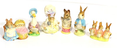 Lot 104 - Beswick Beatrix Potter figures comprising: Flopsy, Mopsy and Cottontail, style one; Hunca...