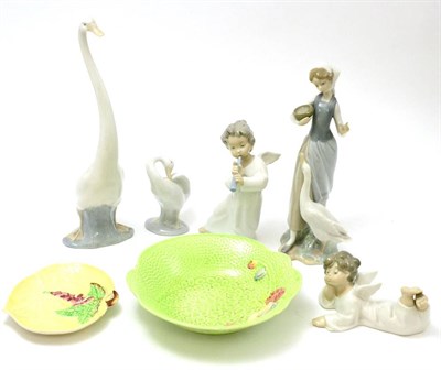 Lot 127 - Four Lladro figures, one Nao figure, Carlton ware dish and a Mella ware dish