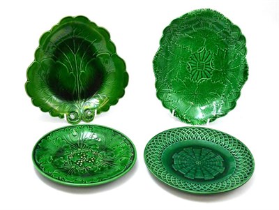 Lot 130 - A group of four majolica plates, all 19th century including Wedgwood