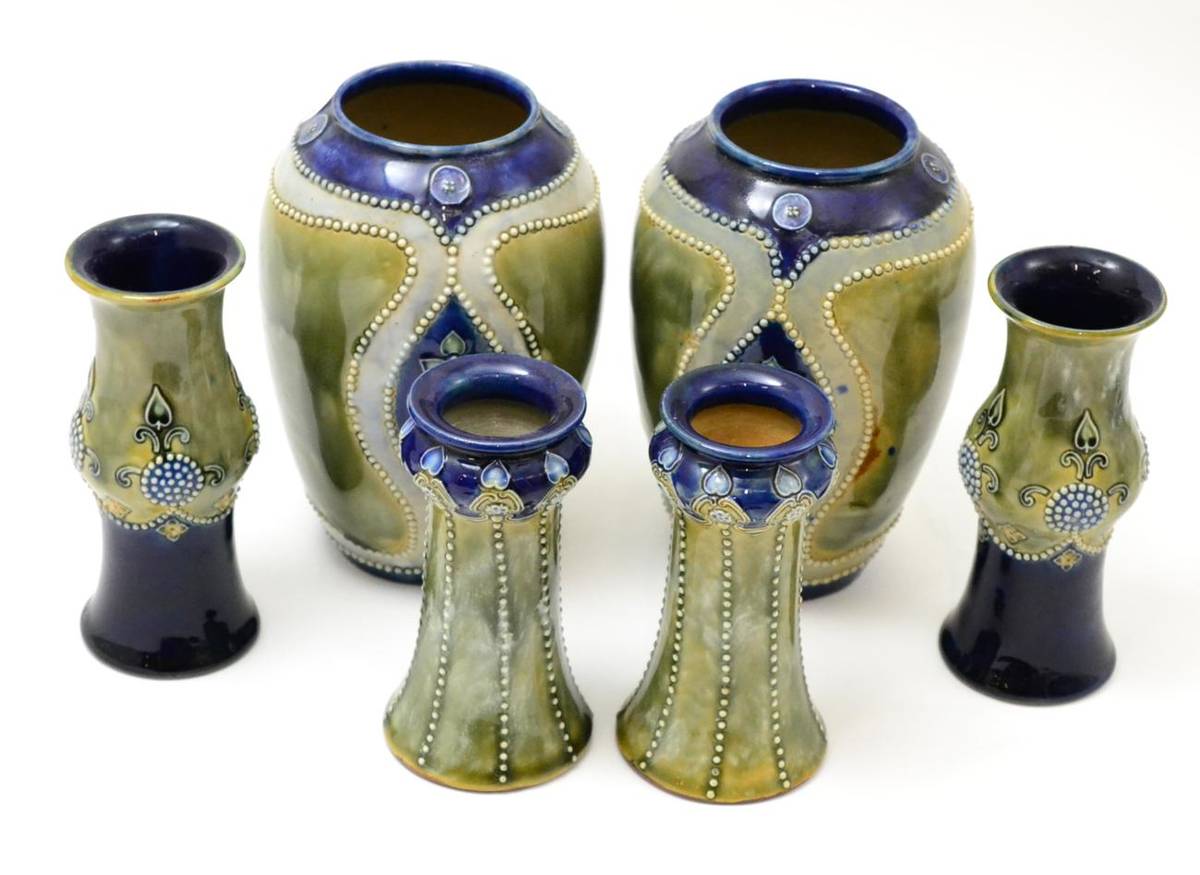 Lot 155 - Three pairs of similar Royal Doulton vases