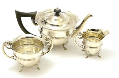 Lot 157 - A silver three piece tea service