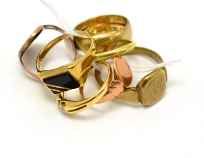 Lot 183 - A group of rings including a 9ct gold band ring, four gents 9ct gold rings, an 18ct gold band ring