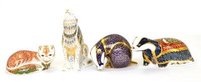 Lot 202 - Four Royal Crown Derby paperweights including: Badger, Howling Wolf, Leicester Fox and...