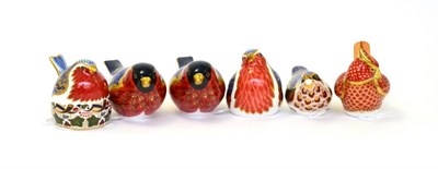 Lot 208 - Six Royal Crown Derby paperweights including: two Bullfinches (each with gold stoppers), Robin...