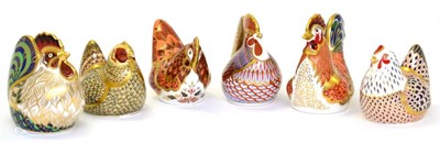 Lot 210 - Six Royal Crown Derby paperweights including: Cockerel (gold stopper), Chicken (silver...