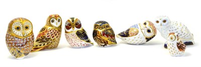 Lot 215 - Seven Royal Crown Derby paperweights including: Short Eared Owlet (gold stopper), Little Owl...