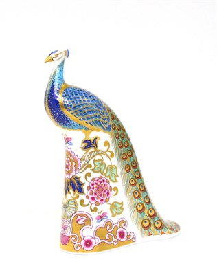 Lot 217 - A Royal Crown Derby paperweight, Derby Peacock (27/750 and with gold stopper)