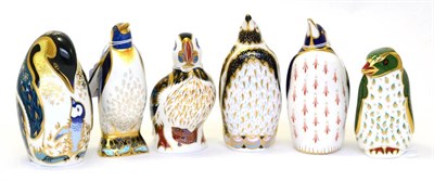 Lot 220 - Six Royal Crown Derby paperweights including: Puffin (silver stopper), Emperor Penguin (gold...