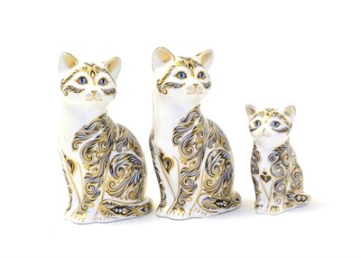 Lot 232 - Three Royal Crown Derby paperweights including: two Majestic Cats and Majestic Kitten (each...