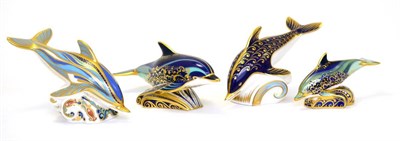 Lot 239 - Four Royal Crown Derby paperweights including: Dolphin, Lyme Bay Dolphin, Lyme Bay Baby...