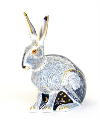 Lot 244 - A Royal Crown Derby Paperweight, Starlight Hare (gold stopper) together with a collectors guide