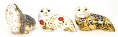 Lot 270 - Three Royal Crown Derby paperweights including: Russian Walrus (gold stopper), Seal (silver...