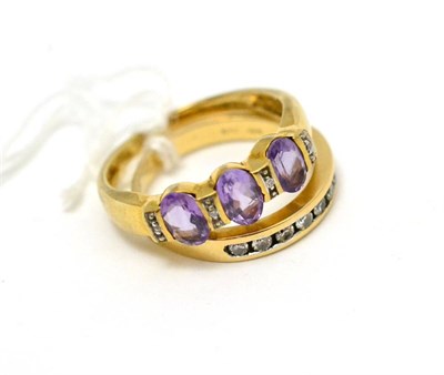 Lot 293 - A diamond half hoop ring, stamped '14K' and a 9ct gold amethyst and diamond ring (2)