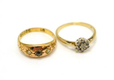 Lot 295 - A 9ct gold diamond cluster ring and a Victorian ring (2)