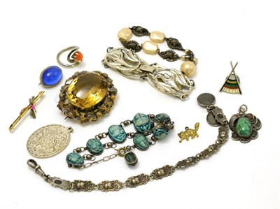 Lot 302 - A citrine brooch and assorted bracelets and white metal jewellery