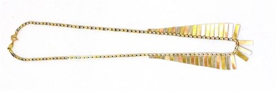 Lot 304 - A 9ct gold three colour Cleopatra necklace