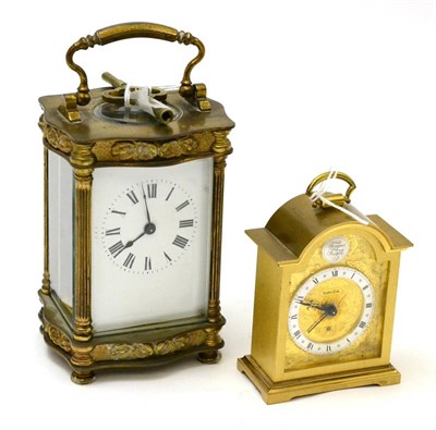 Lot 313 - A carriage timepiece and a miniature alarm timepiece signed Swiza