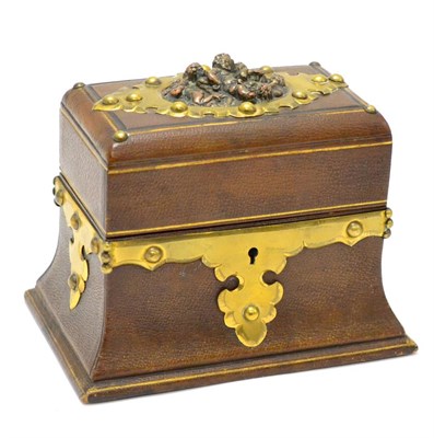 Lot 317 - A late 19th century French leather bound casket with two cut glass scent bottles