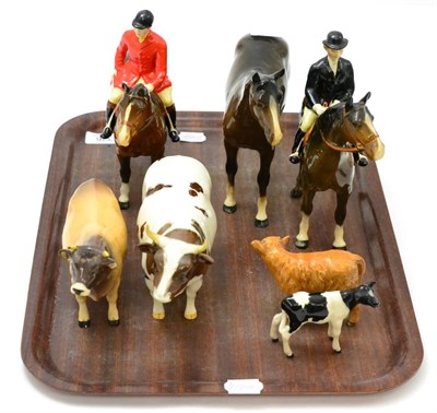 Lot 336 - A group of Beswick comprising huntsman, hunt lady, bay hunter, two cattle and two calves