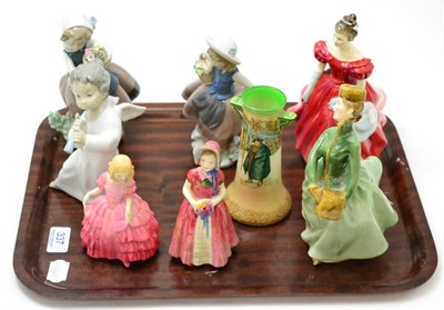 Lot 337 - A group of four Royal Doulton figures, three Lladro figures and a Royal Doulton series ware vase