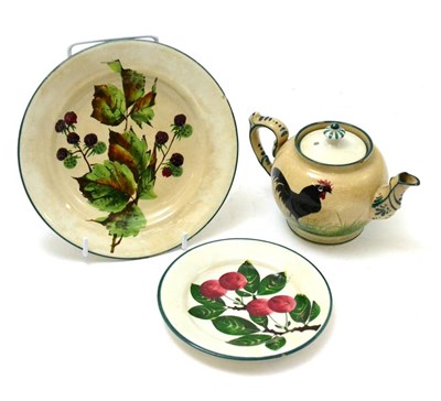 Lot 350 - Wemyss cockerel teapot, Wemyss cherry pattern saucer and a Wemyss blackberry plate (3)