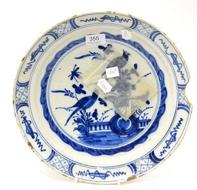 Lot 355 - An 18th century tin glazed earthenware plate (a.f.)