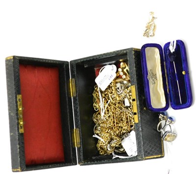 Lot 394 - A box of jewellery including a silver fox mask brooch, a white metal ball topped stick pin, in...