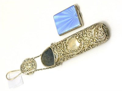 Lot 395 - Embossed silver mounted spectacle case with attached chain and hook and a blue enamel mounted...