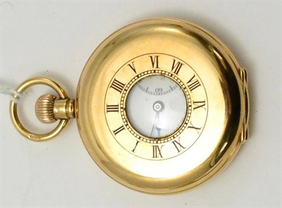 Lot 400 - A 9ct golf half hunter pocket watch retailed J W Benson