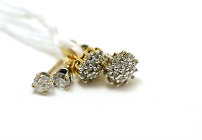 Lot 410 - Two pairs of diamond studs