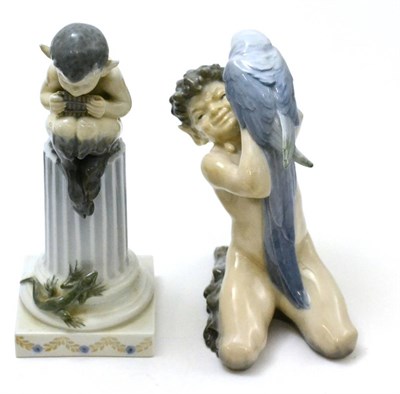 Lot 420 - Two Royal Copenhagen figural groups, Faun with Parrot No.725 and Faun with Lizard No.433