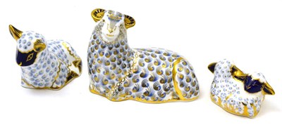 Lot 429 - Royal Crown Derby paperweights seated ram, seated lamb and two nestling lambs (3) all gold stoppers